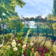 Beautiful flower beds in Monet’s gardens in Giverny, filled with vibrant colors and lush greenery.
