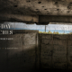 View from a World War II bunker overlooking the Normandy coast during a small-group D-Day tour from Paris.