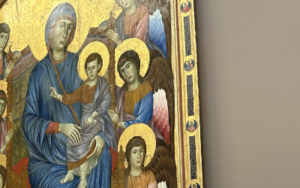 Cimabue, Virgin and Child in Majesty with Angels, circa 1280 — Grande Galerie, Denon Wing First Floor, Louvre Museum Visitor gesturing toward Cimabue's Virgin and Child in Majesty, circa 1280, Louvre Museum Grande Galerie — gold-ground tempera on panel, one of the earliest Italian paintings in the collection, Denon wing first floor