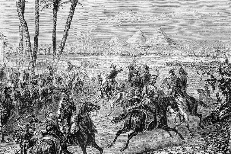 Adobe Stock - Napoleon Bonaparte leading French troops during the Egyptian campaign, with the pyramids visible in the background.