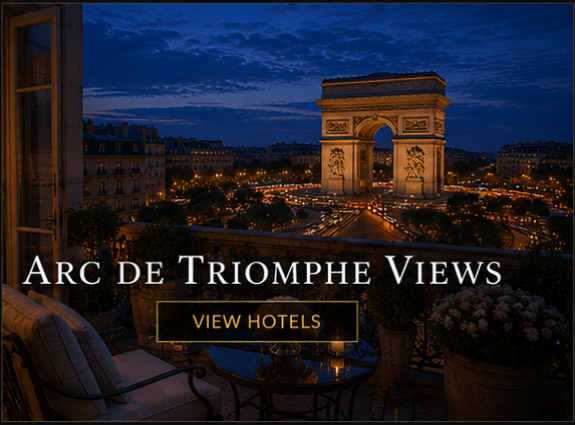 Evening view of the illuminated Arc de Triomphe from a luxury Paris hotel terrace